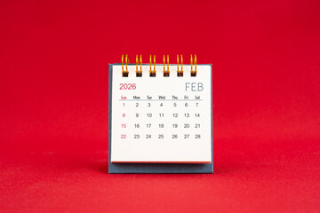 February Mini calendar for 2026 year on red background.