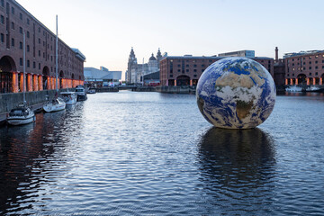 Liverpool, united kingdom May, 16, 2023  Floating earth in Albert Dock for Eurovision 2023
