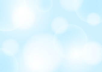 パステルカラーの水色の光が広がるふんわり背景デザイン