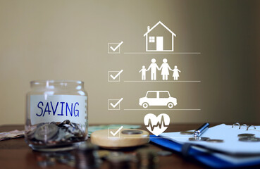 The saving concept with checkmark on home and other important factors in life conveys planning for the future such as having a family, a car and health insurance