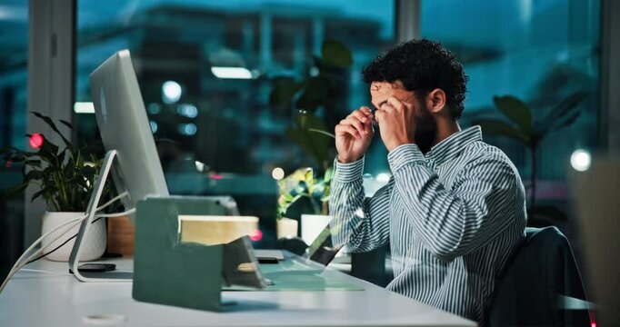 Night, tired and man with computer, business and fatigue with proofreading for article. Evening, exhausted and journalist in office, PC and editor with burnout, stretching or research for news report