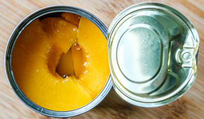 Open Tin Or Can Of Sliced Peaches Dessert Or Cooking Ingredients
