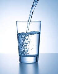 Fresh, clear water being poured into a tall transparent glass against a clean white background. The image captures motion and splash detail, symbolizing purity, hydration, and healthy living.