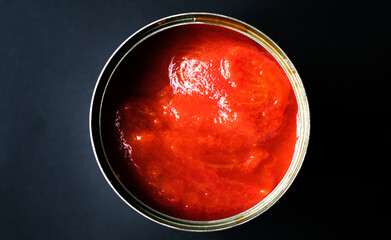 London UK, June 06 2025, Open Tin Of Plum Tomatoes Ready To Cook