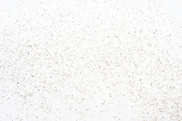 black ground pepper on white, texture