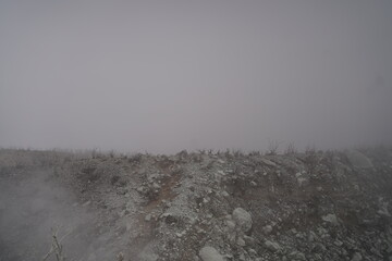misty cloud on a top of mountain