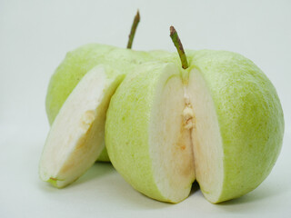 Sliced Green Guava with Seeds – Fresh Exotic Fruit Displayed on White Background for Healthy Eating Concept