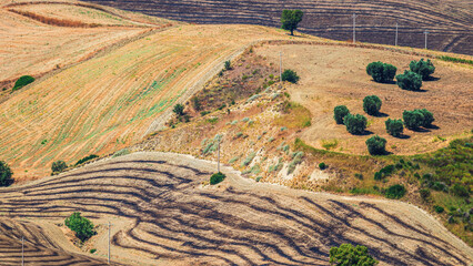 summer countryside landscape with the midday light inside Val D'Agri, Basilicata