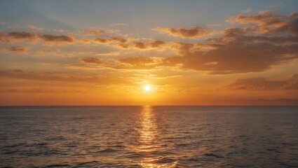 Obraz premium Amazing sunlight during beautiful sunset or sunrise over the sea with a golden sky background