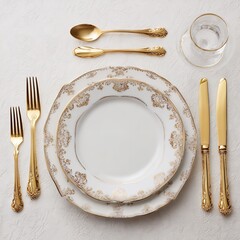 Elegant table setting with gold cutlery and fine china for formal dining and special occasion events