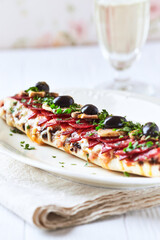 Open-faced toasted cheese sandwich on white background. Close up	