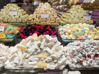 Various Turkish sweets, delicacies, pastries, dried fruits on display on the streets of the city.