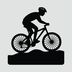Obraz premium Silhouette mountain biker riding down hill Vector Illustration