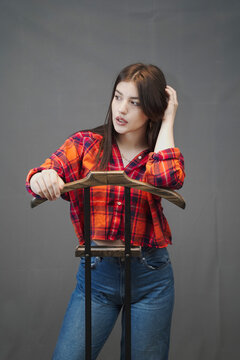 Fototapeta Stylish Woman in Casual Denim and Plaid Crop Top – Studio Fashion Portrait