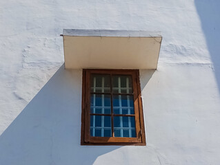 windows in the old building, front view of isolated de Javasche bank windows, square dark brown window