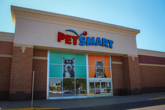 The facade of a Pet Smart store in a suburban Minneapolis location isolated against a blue sky in May 2025. Editorial Use Only.