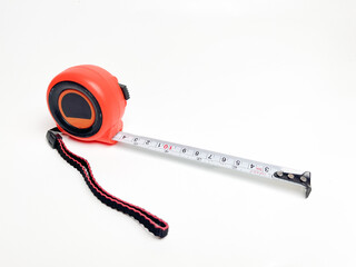 Black and orange measuring tape that can be stretched and held at a distance of 10 cm, measuring...