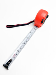 Black and orange measuring tape that can be stretched and held at a distance of 10 cm, measuring...