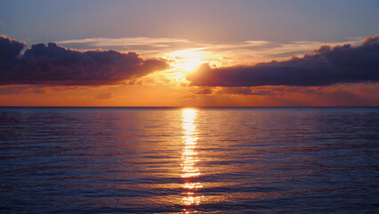Sunset over the tranquil ocean creates a serene and reflective atmosphere while hues of orange and purple blend in the sky