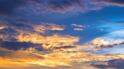 Obraz premium Serene Golden Dusk Blue Cloudy Sky Background – Warm-Cool Color Harmony, Soft Cloud Glows, Tranquil Evening Atmosphere