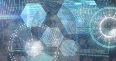 Image of data processing on digital screen over thoughtful caucasian businessman