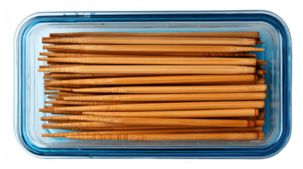 Numerous wooden toothpicks are neatly arranged and stored within a transparent blue plastic container, set against a transparent background, emphasizing organization and hygiene in oral care