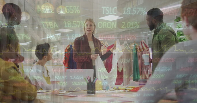 Image of financial graphs and data over diverse female and male coworkers in office