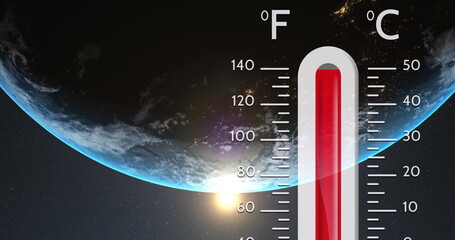Image of digital thermometer over globe