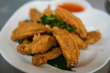Fried chicken served on plate. Thai food.