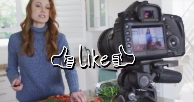 Image of like text over caucasian woman cooking, making vlog using camera