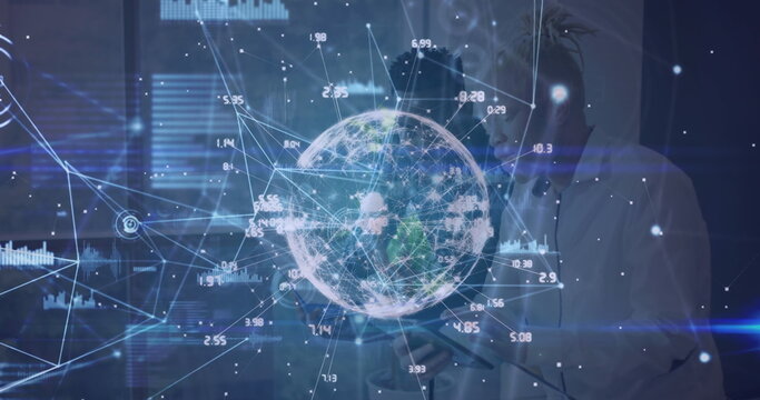 Image of network of connections and globe over two diverse business people