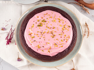 Beetroot chocolate cake with pink cream cheese pistachio icing