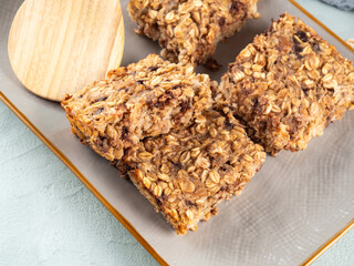 Baked oatmeal peanut butter banana cake bars with chocolate chips
