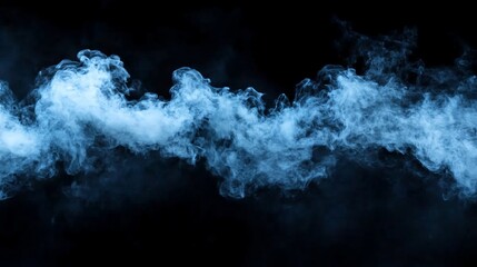 Obraz premium Wispy, ethereal blue smoke billows across a stark black background