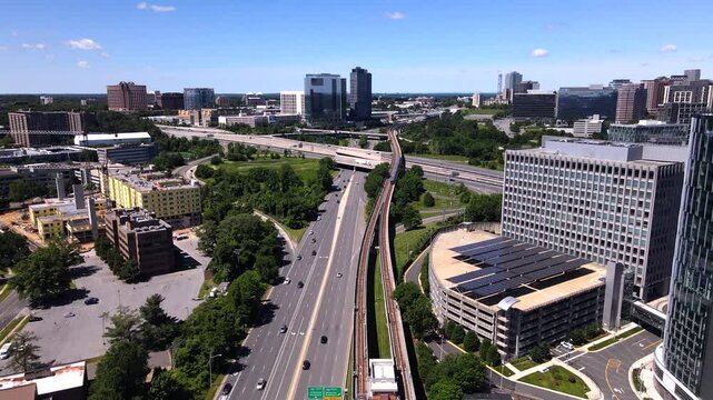 Tysons City Infrastructure. The train leaves from the subway station. The camera follows the train.
