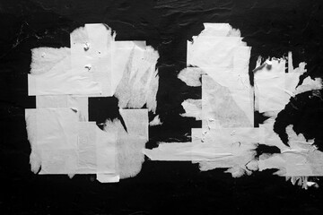 Old poster on black background.