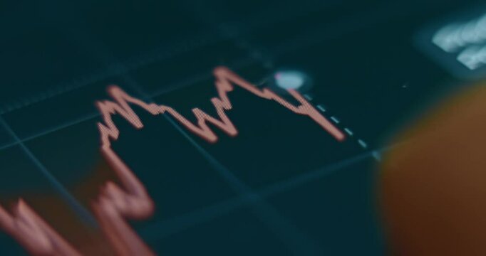 Following the graph with finger, chart with downward trend