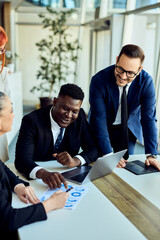 Team Discussing Results During a Business Meeting in a Modern Office Setting