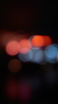 Defocused flashing red and blue lights, concept of police sirens and emergency