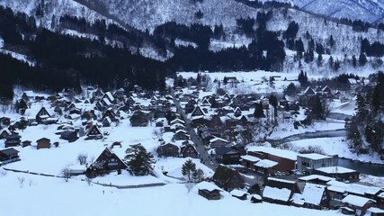 Panoramic View of Snow-Covered Gassho-Style Houses in Winter Village