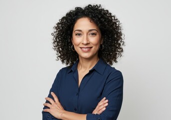 Portrait of a smiling woman with curly hair isolated on white background