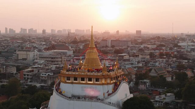 Aerial view of wat saket, golden mount, during a beautiful sunset in Bangkok, Thailand.