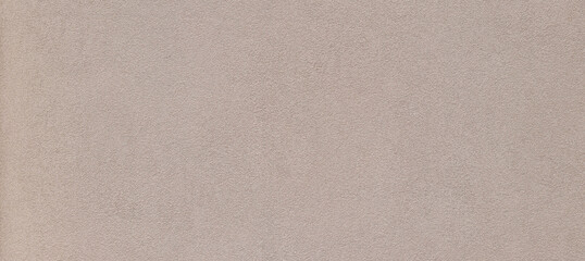 Beige plaster wall. Building wall background texture. Light sand color wall. Texture. Cream plaster with sand texture. Beige textured background. Grainy background
