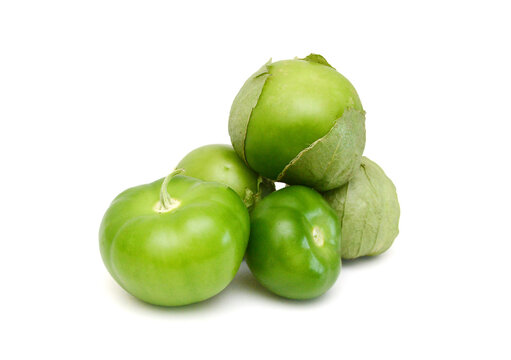 Stack tomato tomatillos fruits isolated on white background 