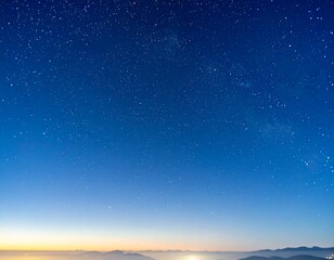 Fototapeta premium Starry night sky over a misty horizon