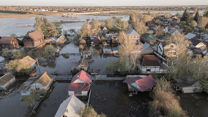 Fototapeta na wymiar Global warming, floods on the planet.The apocalypse, catastrophes.Storms and destruction.Natural disasters,climate change,the riot of nature.The remnants of human life are floating in dirty water.End