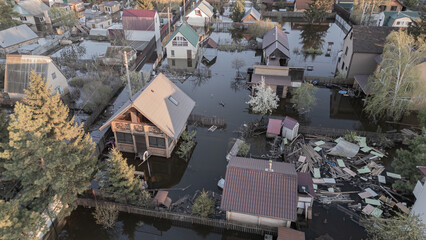 Fototapeta na wymiar Floods and cyclone, global warming. Climate change,natural disasters the tsunami of nature.The apocalypse, catastrophes.Storms and destruction.The remnants of human life are floating in dirty water
