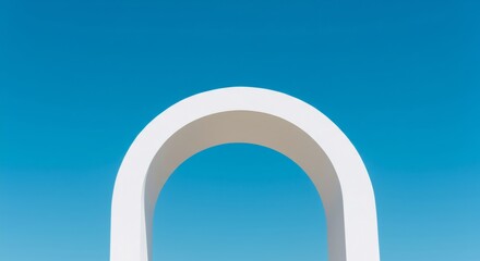 Minimalist white arch against a clear blue sky, a simple modern architectural design for outdoor wedding ceremony decoration.