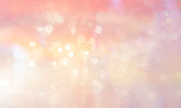Soft bokeh lights create a dreamy background with warm colors