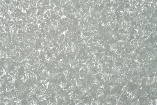 Full frame close up of clear plastic bubble wrap, creating a textured background